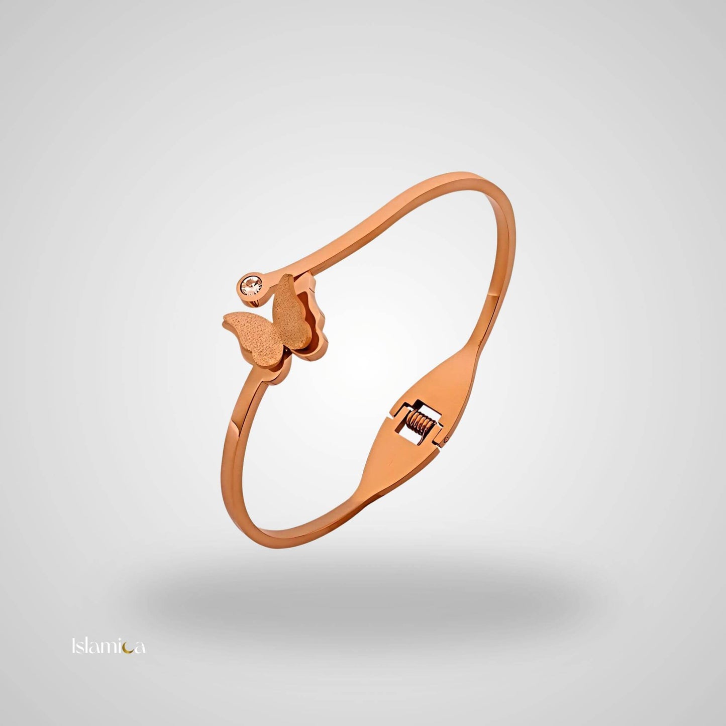 Roségouden armband met vlinder en glinsterende zirconia