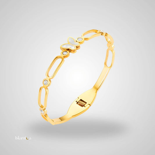 Gouden armband met parelmoer vlinderdesign en zirconia accenten